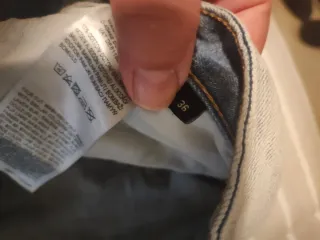 Bermuda vaquera hombre desgastada