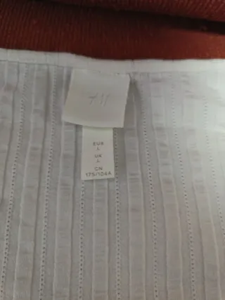Blusa H&M blanca de canalé