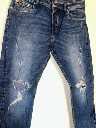 Jeans uomo strappati blu
