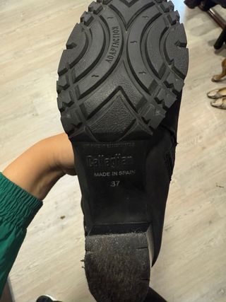 Botas altas negras con cordones