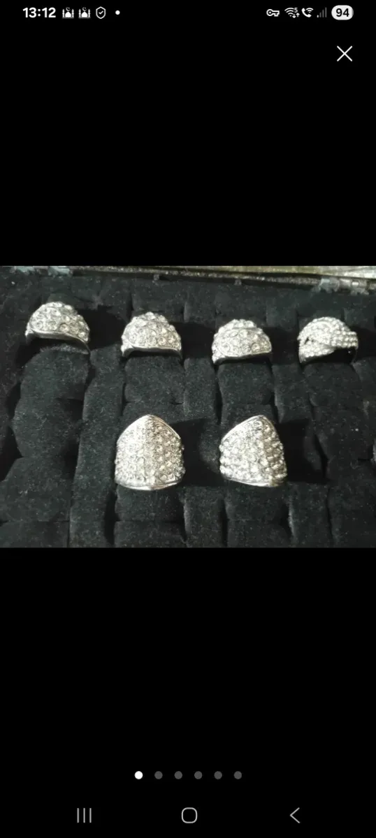 6 Anillos plateados de acero inox con pedrería