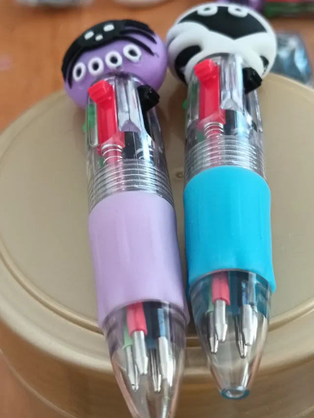 2 Bolígrafos Divertidos + Clips