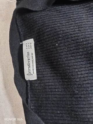 Vestido y chaqueta de punto negro