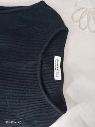 Vestido y chaqueta de punto negro