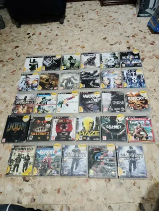 Consola PS3 con mandos y cables