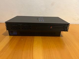 PlayStation 2 con Controller e Gioco