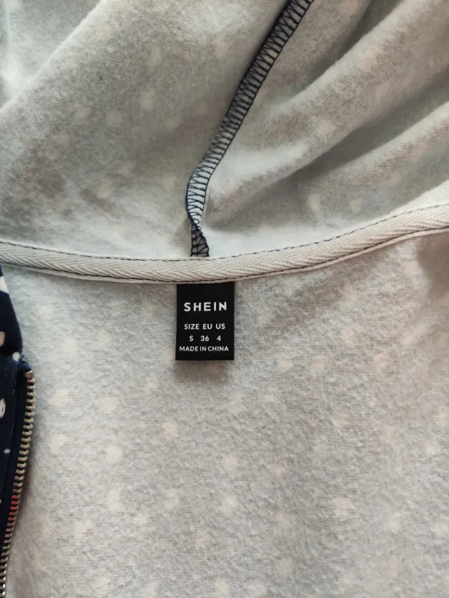 Chaqueta premamá azul con lunares blancos