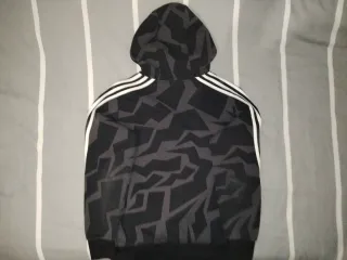 Sudadera Adidas gris y negra con rayas