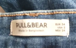 Pantalón vaquero desgastado