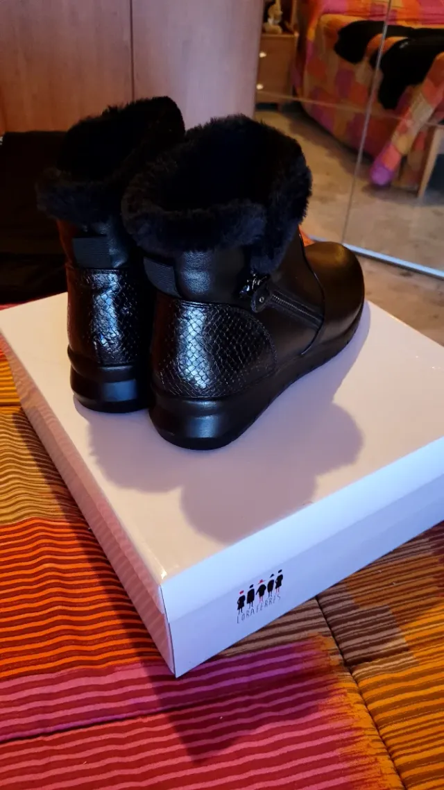 Scarponcino morbido nero con pelliccia