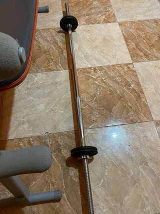 Barra de pesas cromada con discos