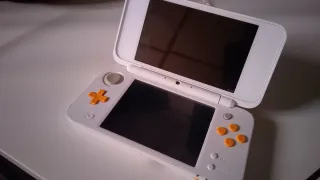 Nintendo New 2ds XL Naranja/Blanco