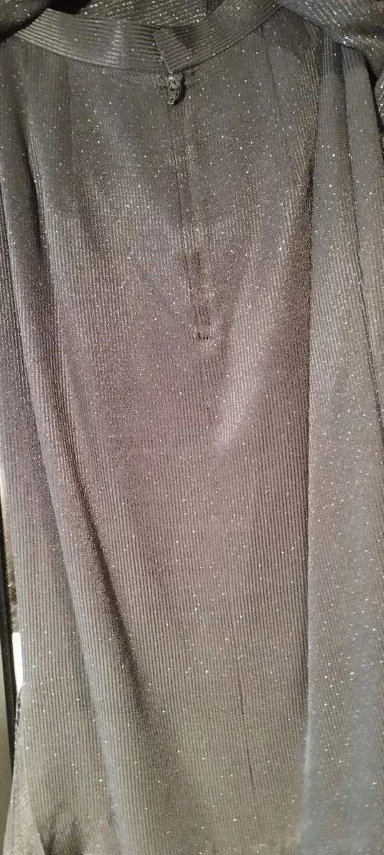 Traje negro chaqueta y falda brillos