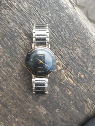 Reloj Rado Negro y Dorado