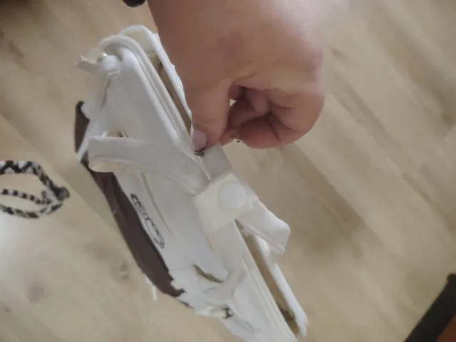 Zaino portatile marrone e bianco grande