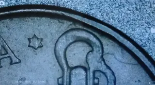 Moneda 50ctms España 1949 con errores