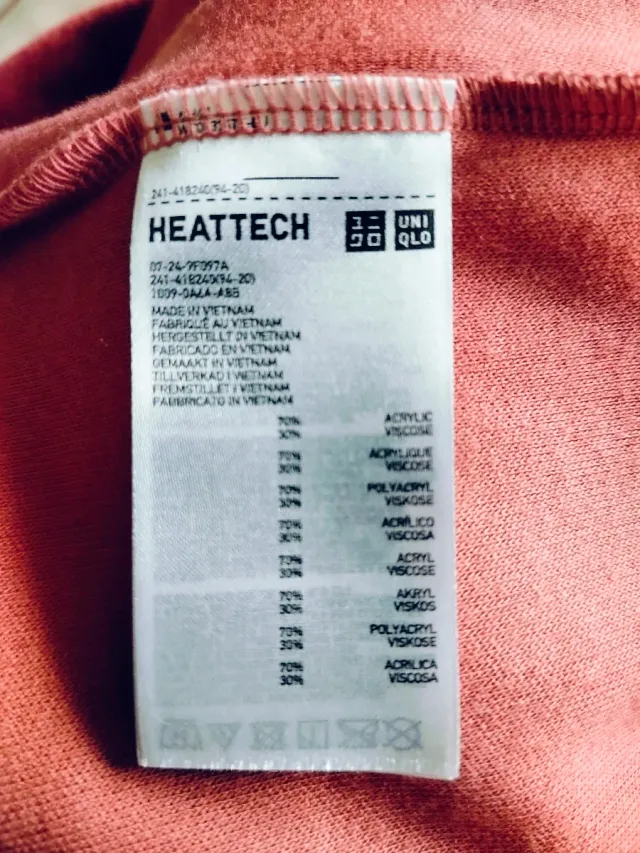 Camiseta Uniqlo cuello alto rosa Talla XL