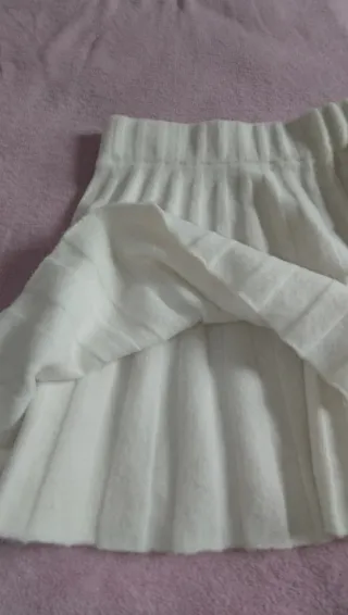 Falda de punto lana color blanco tirando a crema