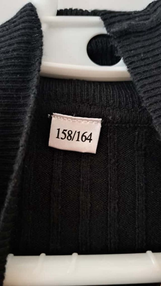 Jersey negro manga larga cuello alto