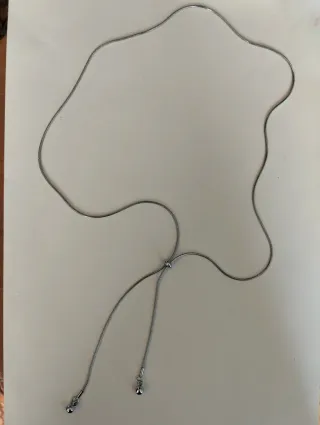 Collar de acero brillo.