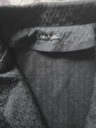 Americana de punto negra