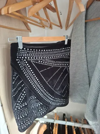 Faldas plateadas brillantes talla única.