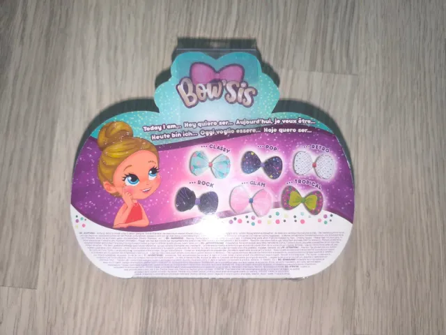 Bow'sis Lazo Sorpresa Muñeca Tropical