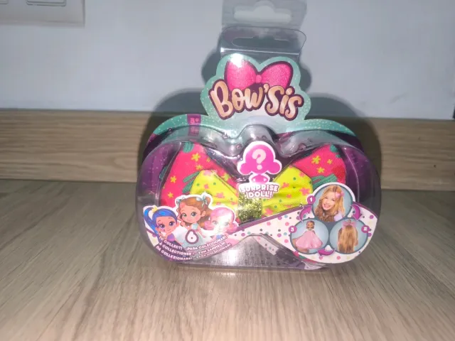 Bow'sis Lazo Sorpresa Muñeca Tropical