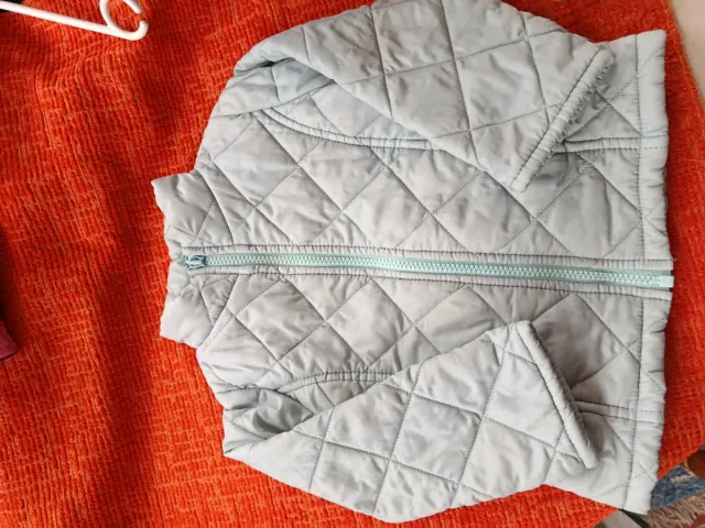 Cazadora Benetton niña azul claro