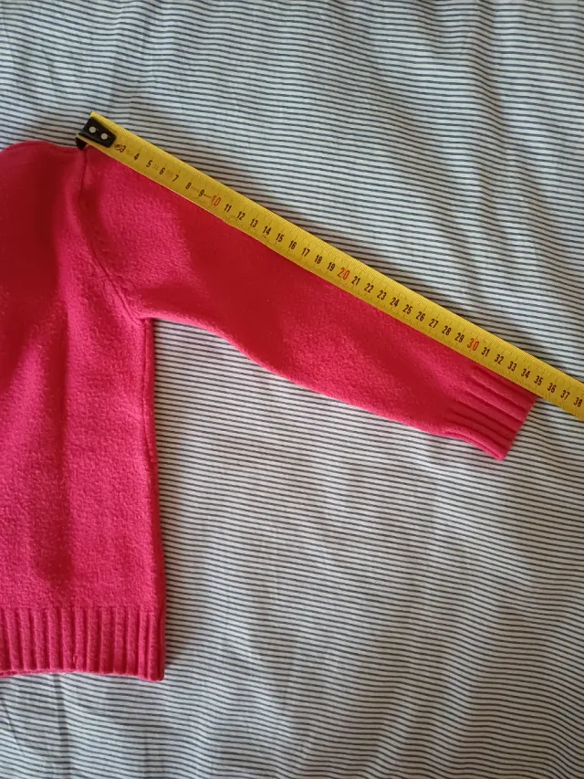 Maglioncino fucsia bambina con tasche