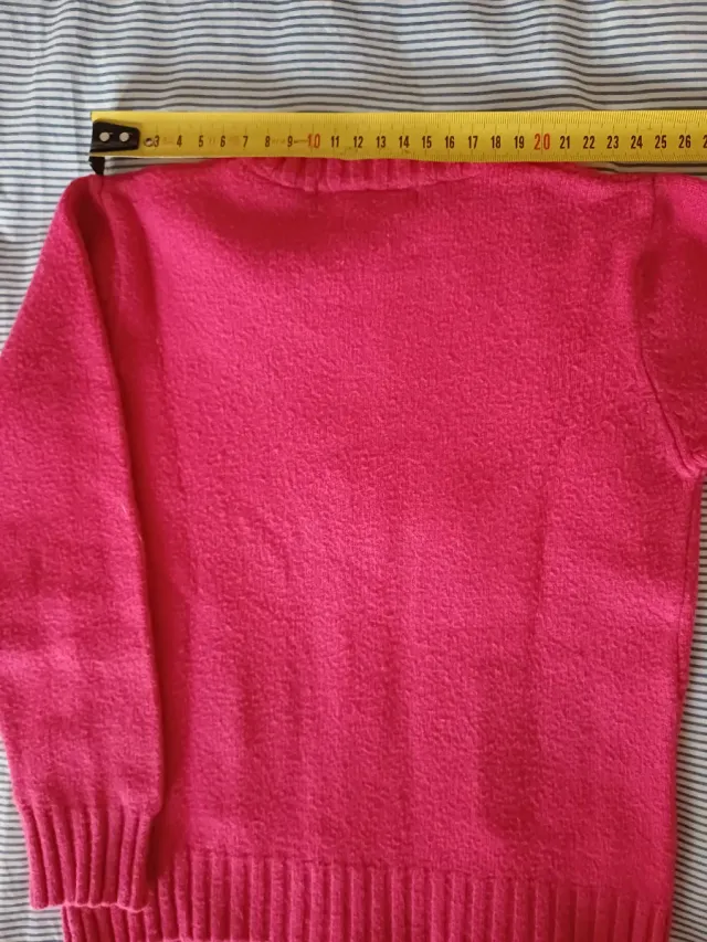 Maglioncino fucsia bambina con tasche