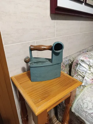 Plancha de carbón antigua