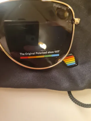 Gafas de sol Polaroid Aviador Doradas Negras