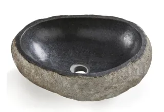 Lavabo de piedra natural sobre encimera