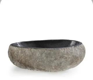 Lavabo de piedra natural sobre encimera