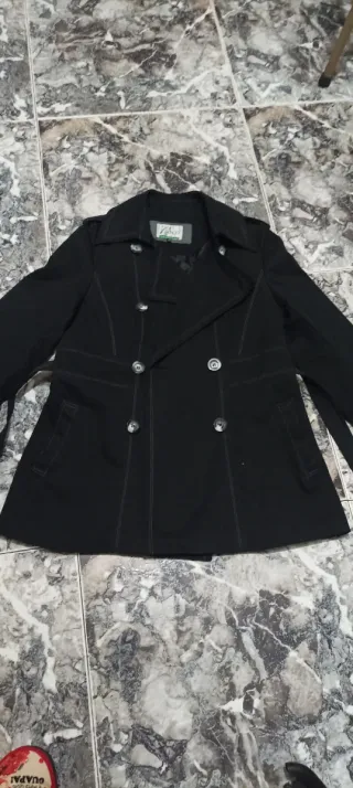 Abrigo negro doble botonadura. Talla M