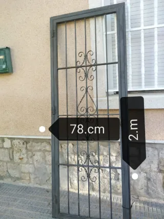 Puerta reja de hierro forjado