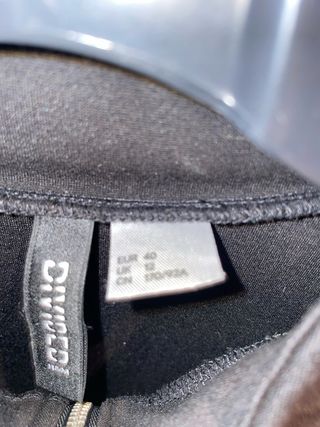 Vestido deportivo H&M negro con detalles naranja