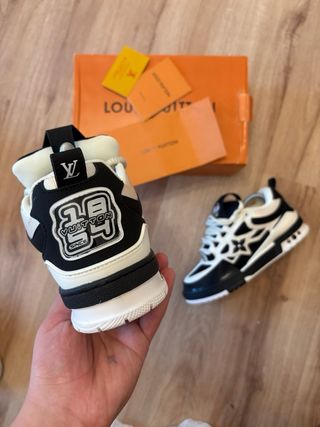 Sneakers Louis Vuitton nere e bianche