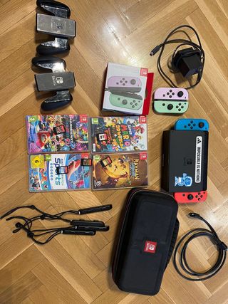 Nintendo Switch OLED + 4 Giochi + Accessori