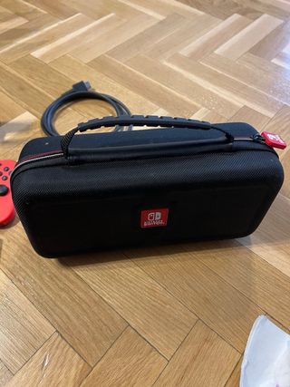 Nintendo Switch OLED + 4 Giochi + Accessori