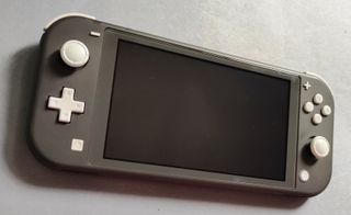 Nintendo Switch Lite Grigio + Animal Crossing