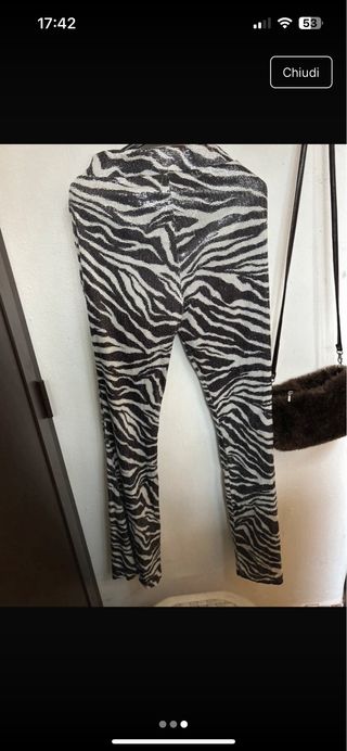 Pantaloni a zampa zebrati paillettati