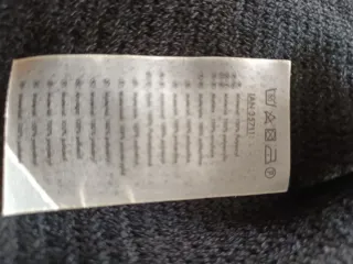 Bufanda de punto negra con flecos