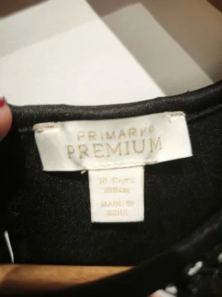 Maglia paillettes nere e argento