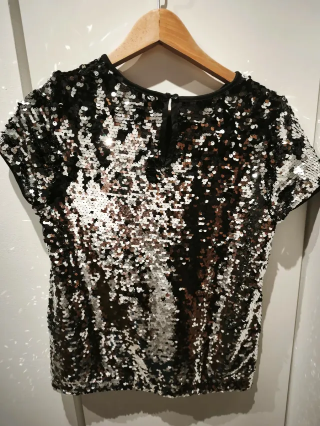 Maglia paillettes nere e argento