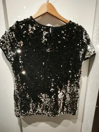 Maglia paillettes nere e argento