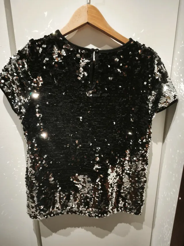 Maglia paillettes nere e argento