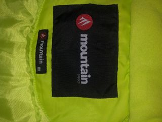 Mono de nieve infantil azul y verde