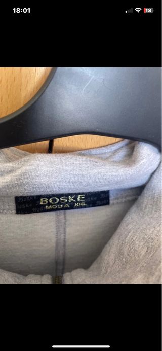 Chaqueta larga chándal gris es elástica